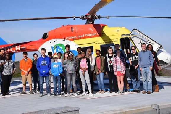 "Children Need Children's," KIDS Georgia members tour Children's Healthcare of Atlanta's medical helicopter, a flying pediatric ICU. Credit: Hunter Darsey, KIDS Georgia Photographer