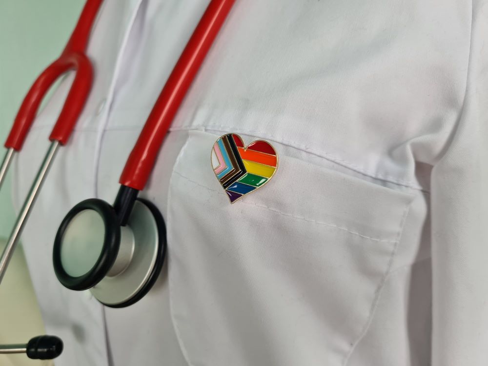 Doctor lab coat with lgbtq pin
