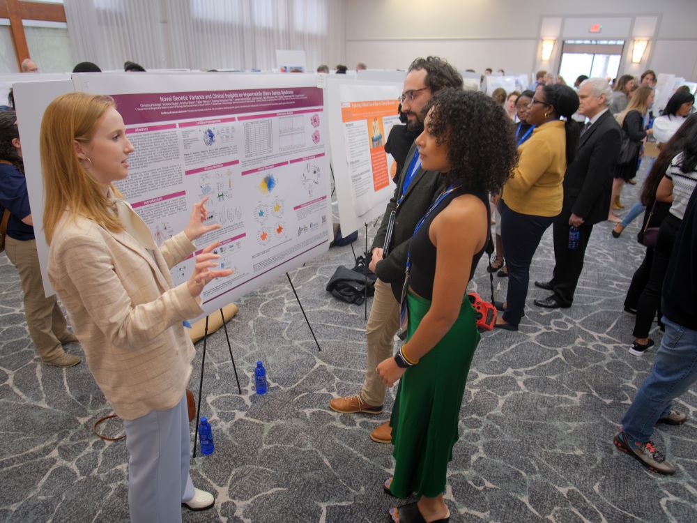 researchers presenting posters