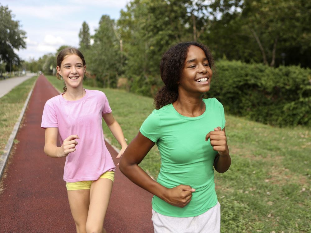 two young women jogging