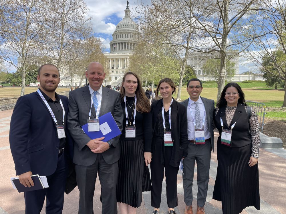 leader and trainees on capitol hill