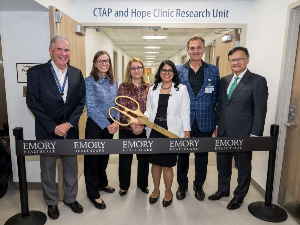 (L-R) David Stephens, MD; Anice Lowen, PhD; Nadine Rouphael, MD; Seema Lakdawala, PhD; Angel Leon, MD, and Joon Lee, MD take part in the ribbon cutting for the new Emory Center for Transmission of Airborne Pathogens (CTAP) research unit, in collaboration with Emory Hope Clinic.