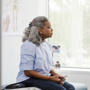 image of woman sitting in a doctor's office