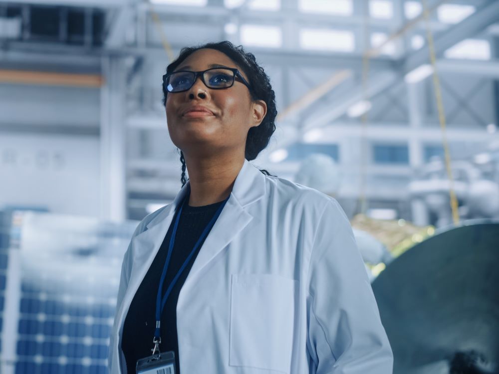 proud female scientist in lab