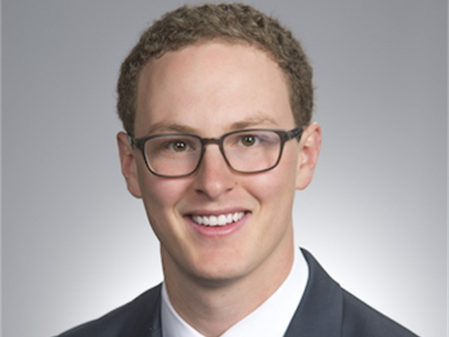 Man smiling for a headshot photo