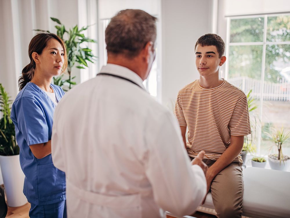 medical staff talking with patient