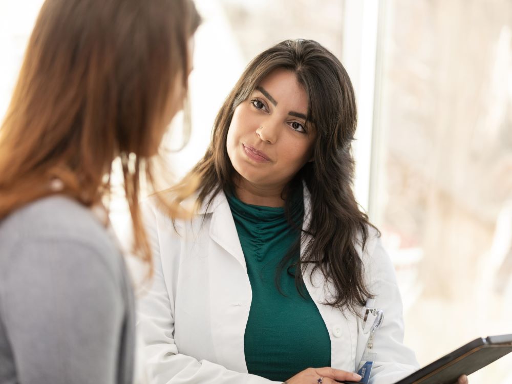 researcher with patient