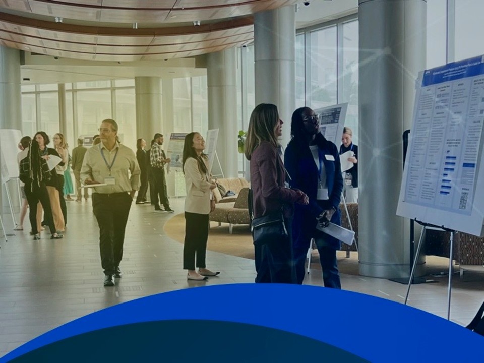 researchers at symposium